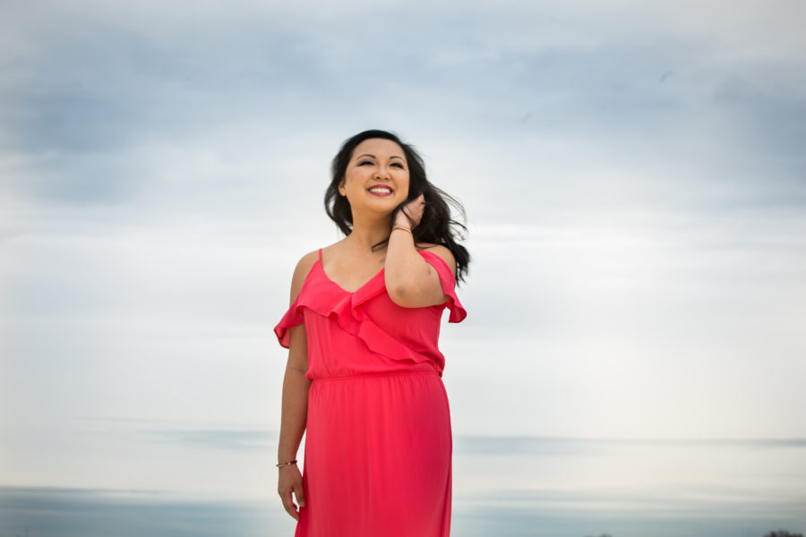woman in hot pink dress rooftop empowered portraits